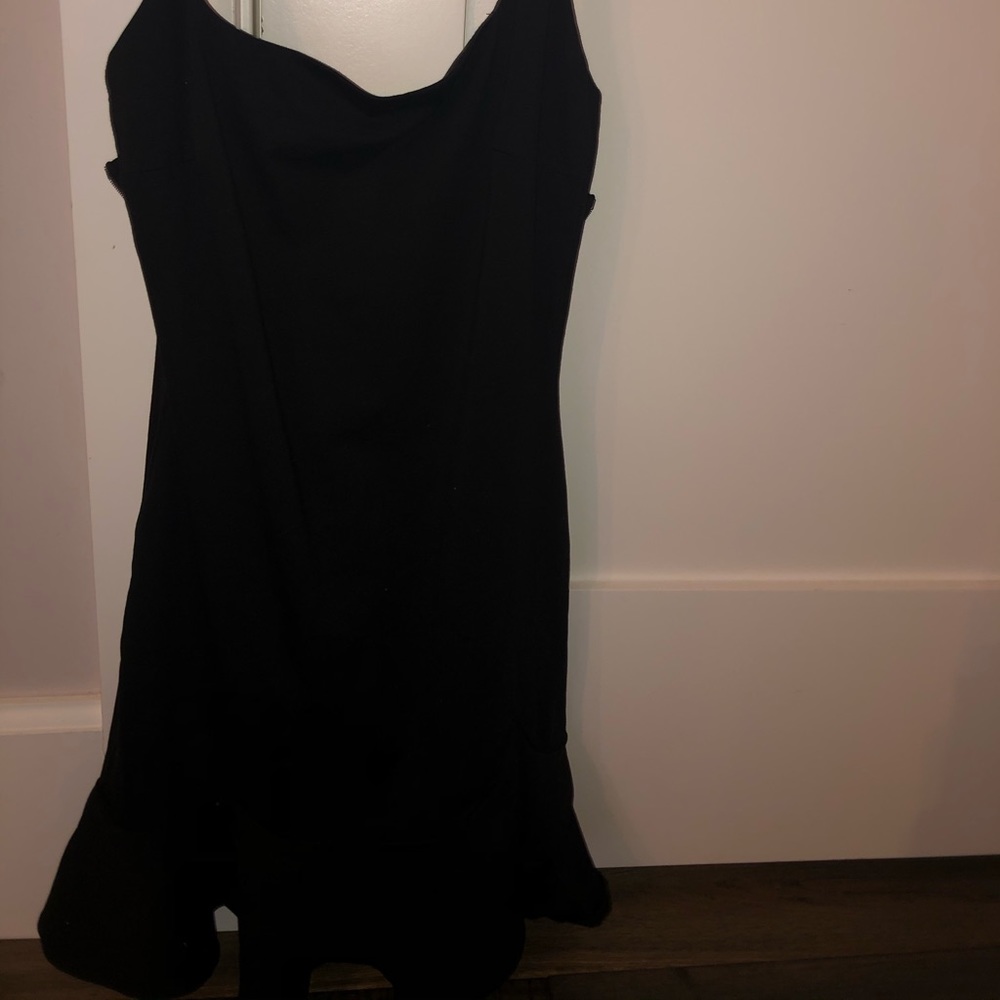 Black mini dress with ruffles on the bottom